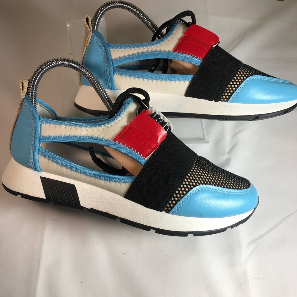 Wee boo sneakers with side cutouts.